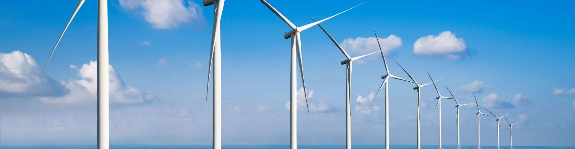 Solar energy panel photovoltaic cell and wind turbine farm power generator in nature landscape for production of renewable green energy is friendly industry. Clean sustainable development concept.